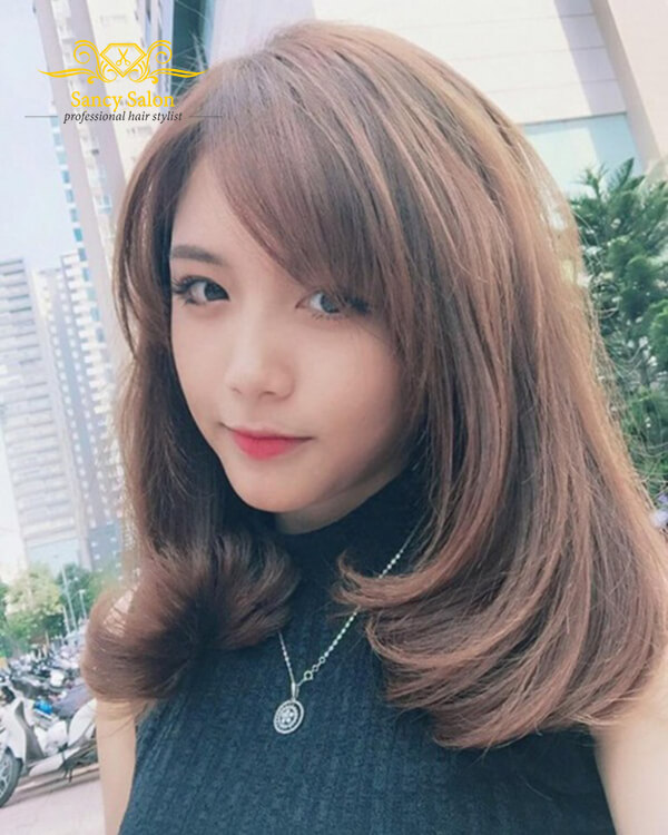 Kiểu tóc tỉa layer Hàn Quốc uốn cụp đẹp cho các bạn nữ